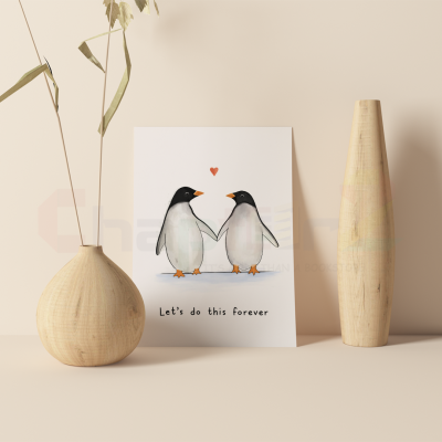 anniversary card featuring holding hands penguins design