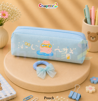 pencil pouch featuring swimming character with goggles shown upright on a display podium with cute stationery items surrounding it