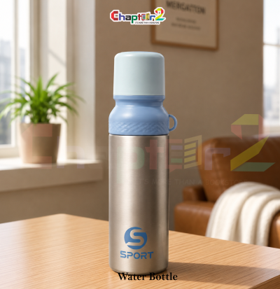 water bottle featuring blue sport metallic design shown upright on a wooden table with a cozy background