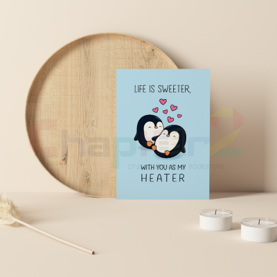 cute cuddling penguin couple i love you greeting card on sky blue