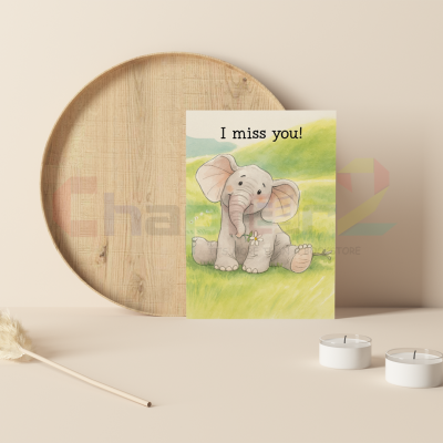 cute watercolor baby elephant sitting in green grassy meadow i miss you greeting card