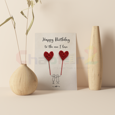 romantic happy birthday greeting card featuring 3D crocheted red hearts and stick figures design