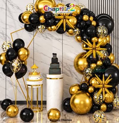 Black and gold balloon arch kit featuring gold starburst foil balloons and confetti balloons