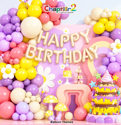 Birthday cake balloon arch kit featuring multi-tier birthday cake foil balloon and silver Happy Birthday letters