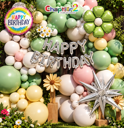 Daisy flower birthday balloon garland decoration set with pastel sage green balloons, silver starburst foil, and silver Happy Birthday banner